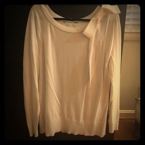 White sweater with bow detail